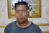Tersangka SU yang bekerja sebagai tukang parkir  dan mantan Satpam. Foto: Istimewa